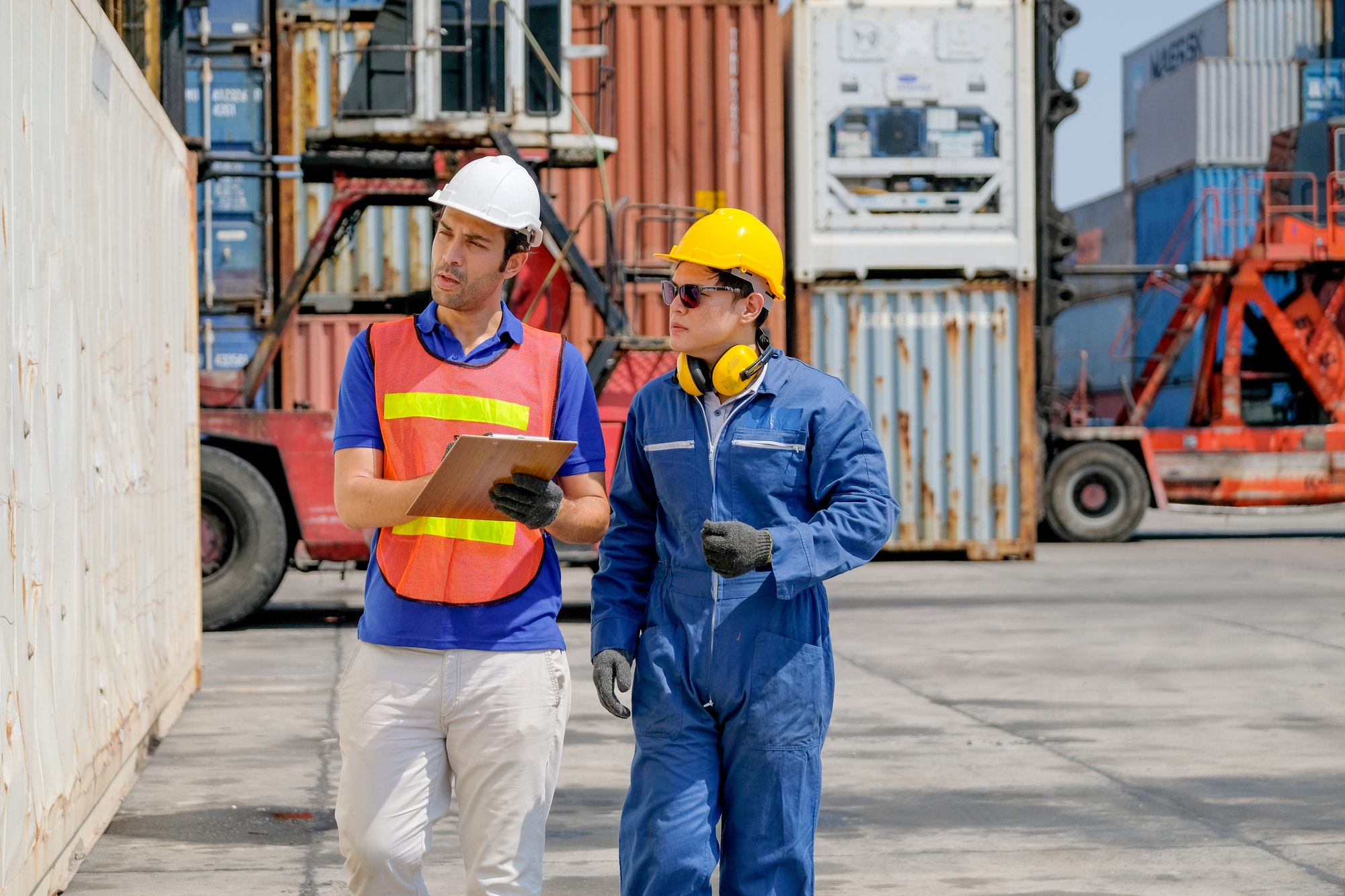 technician-and-engineer-work-together-for-checking-quality-and-product-in-cargo-container.jpg